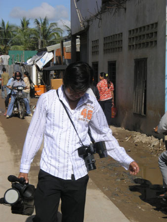 The cameraman readies himself for the day