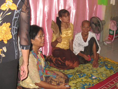 05) Somaly's Grandmother is 85 years old and was happy to be sat down in the heat of the morning